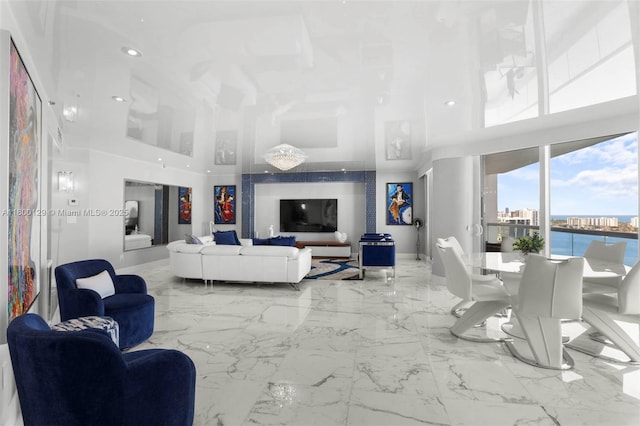 2600 Island Blvd Unit 2603, Aventura, FL 33160 - living room with a towering ceiling, marble tiled flooring, recessed lighting, and baseboards