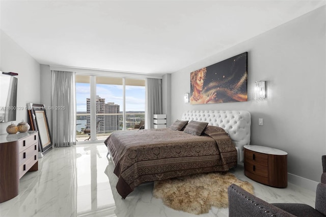 2600 Island Blvd Unit 2603, Aventura, FL 33160 - bedroom with light marble finish flooring, access to outside, and expansive windows