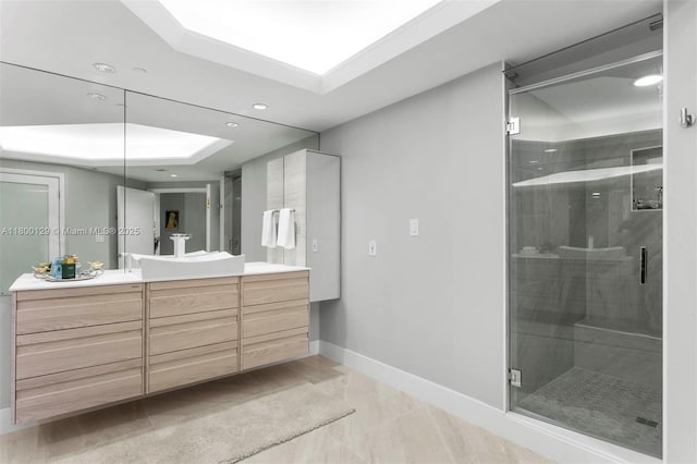 2600 Island Blvd Unit 2603, Aventura, FL 33160 - bathroom with a stall shower, vanity, a tray ceiling, baseboards, and recessed lighting