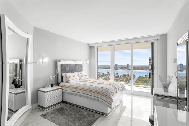 2600 Island Blvd Unit 2603, Aventura, FL 33160 - bedroom with light marble finish flooring, access to outside, a water view, and floor to ceiling windows