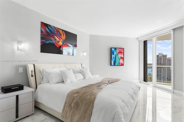 2600 Island Blvd Unit 2603, Aventura, FL 33160 - bedroom with light marble finish floors and a wall of windows