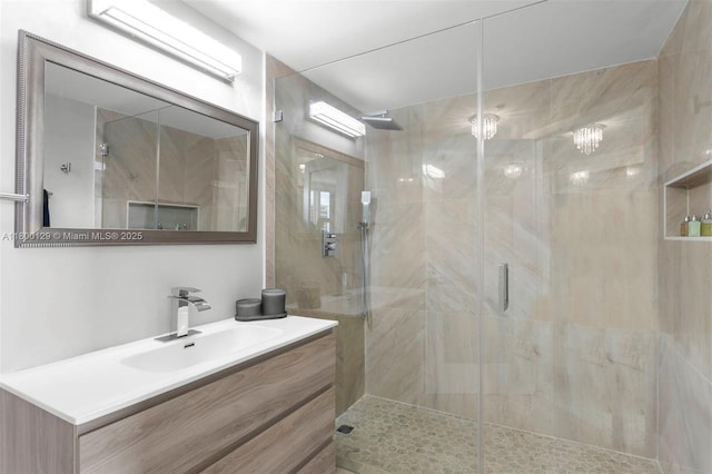 2600 Island Blvd Unit 2603, Aventura, FL 33160 - full bathroom featuring a shower stall and vanity