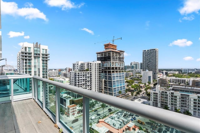 balcony featuring a city view