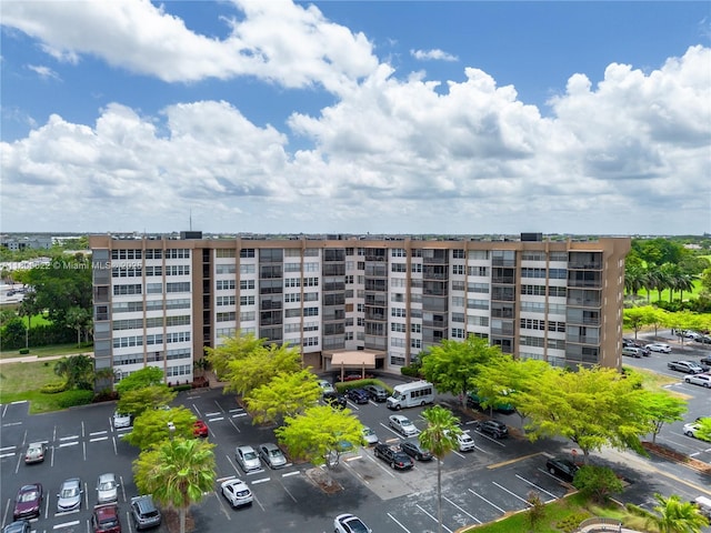 1100 Saint Charles Pl Unit 407, Pembroke Pines, FL 33026 - view of apartment building / complex with uncovered parking