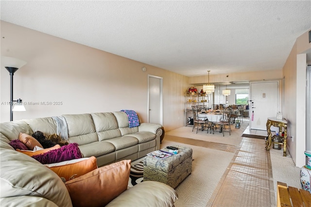 1100 Saint Charles Pl Unit 407, Pembroke Pines, FL 33026 - living area with a textured ceiling
