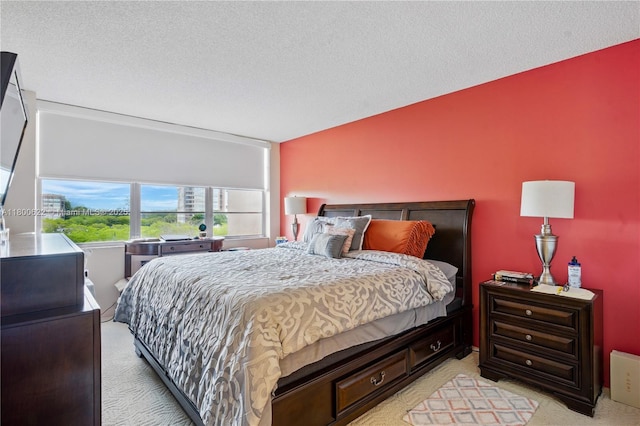 1100 Saint Charles Pl Unit 407, Pembroke Pines, FL 33026 - bedroom with light colored carpet and a textured ceiling