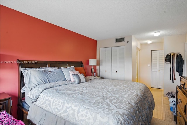 1100 Saint Charles Pl Unit 407, Pembroke Pines, FL 33026 - bedroom with two closets and carpet flooring