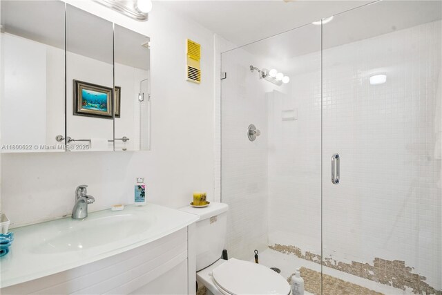 1100 Saint Charles Pl Unit 407, Pembroke Pines, FL 33026 - bathroom featuring a shower stall, toilet, and vanity