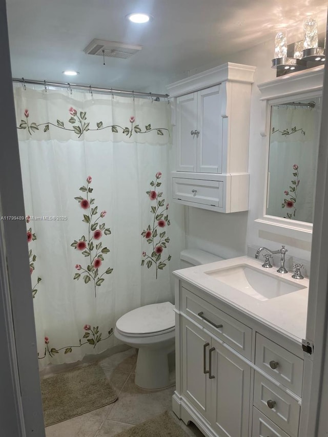 7680 NW 18th St Unit 107, Margate, FL 33063 - full bath with tile patterned flooring, toilet, vanity, recessed lighting, and a shower with curtain