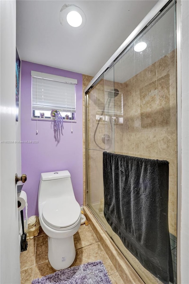 1951 SW 81st Ter, Davie, FL 33324 - full bath featuring a stall shower, tile patterned floors, and toilet