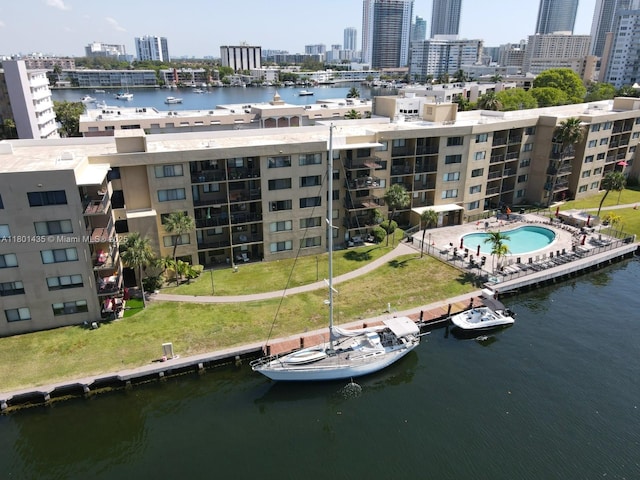 301 Golden Isles Dr Unit 203, Hallandale Beach, FL 33009 - aerial view of a view of skyline, a large body of water, a pool, and apartment complex / building