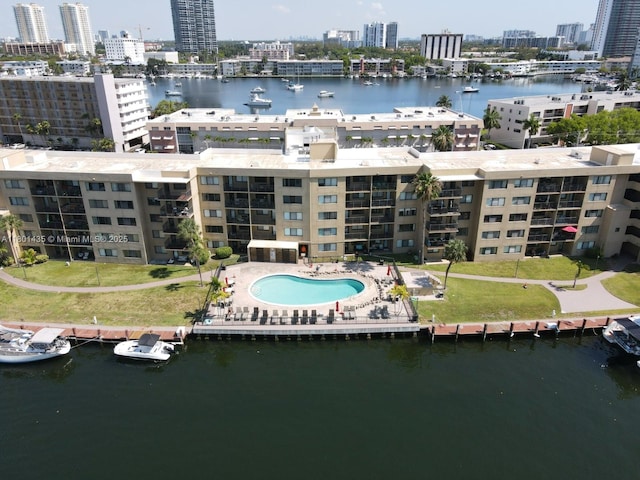 301 Golden Isles Dr Unit 203, Hallandale Beach, FL 33009 - view of urban area featuring a nearby body of water, apartment complex / building, and a pool