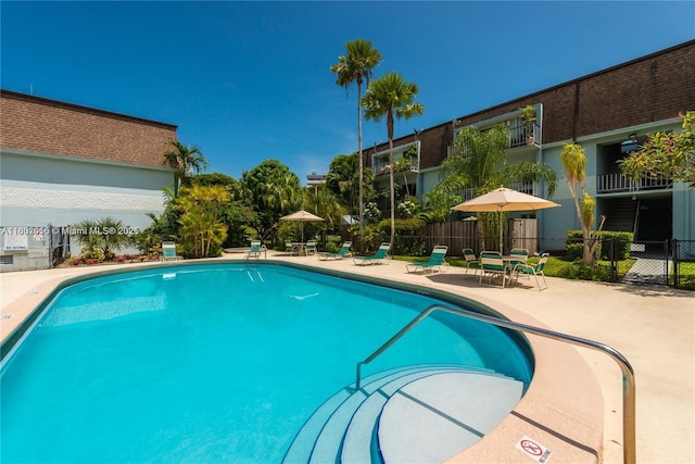 9631 SW 77th Ave Unit 303C, Miami, FL 33156 - community pool with a patio area