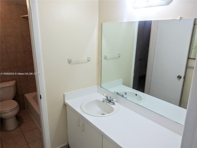 full bathroom featuring tile patterned floors, toilet, and vanity