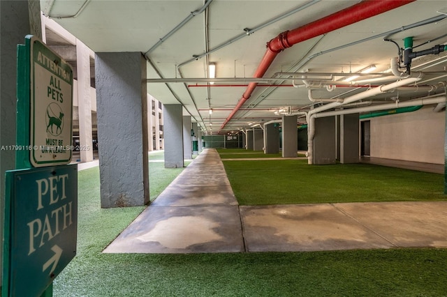 view of property's community with a lawn