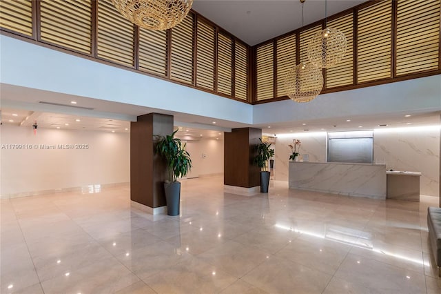 building lobby featuring a towering ceiling