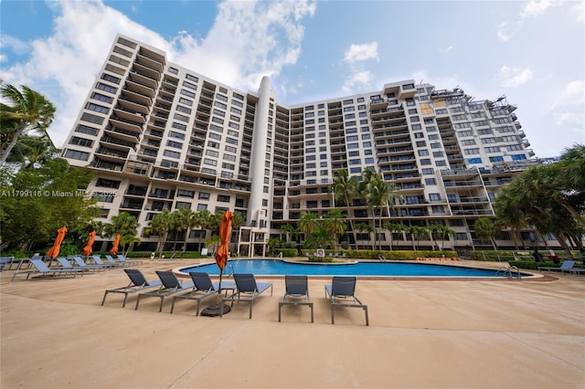 community pool with a patio
