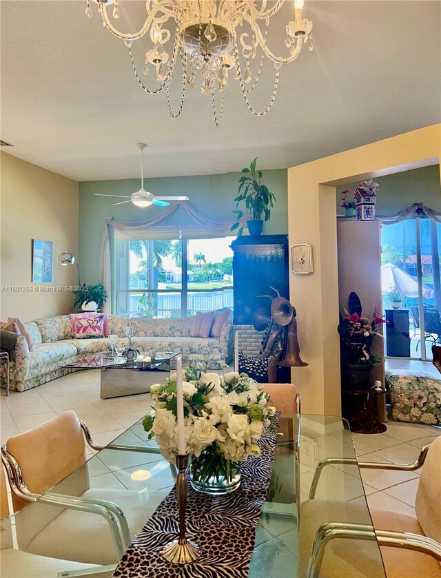 16343 Segovia Cir S, Pembroke Pines, FL 33331 - tiled living area featuring plenty of natural light, a chandelier, and ceiling fan