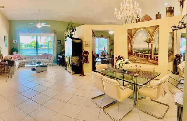 16343 Segovia Cir S, Pembroke Pines, FL 33331 - tiled dining room with ceiling fan, healthy amount of natural light, vaulted ceiling, and a chandelier