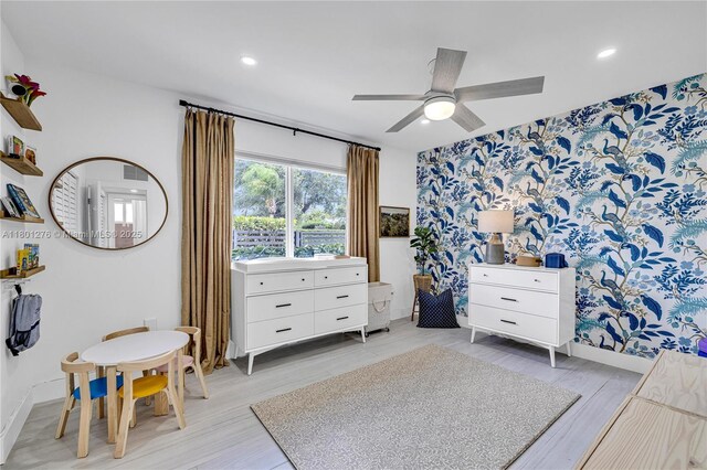 2801 SW 64th Ave, Miami, FL 33155 - bedroom with wallpapered walls, an accent wall, baseboards, light wood-style flooring, and recessed lighting