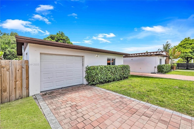 2801 SW 64th Ave, Miami, FL 33155 - ranch-style home with decorative driveway, stucco siding, and an attached garage