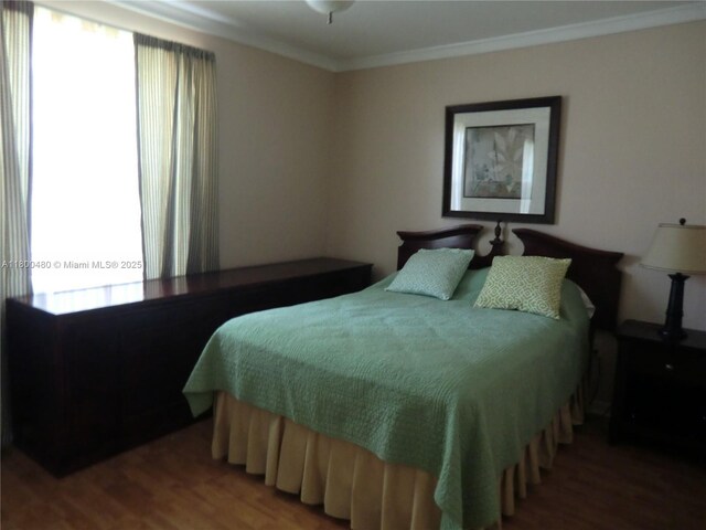 1593 NW 158th Ave, Pembroke Pines, FL 33028 - bedroom featuring wood finished floors and crown molding