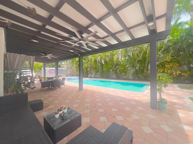 19994 SW 129th Ct, Miami, FL 33177 - swimming pool featuring a ceiling fan, a fenced backyard, and a patio