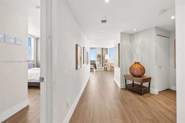 2475 Brickell Ave Unit 2002, Miami, FL 33129 - hall with wood finished floors, baseboards, and recessed lighting