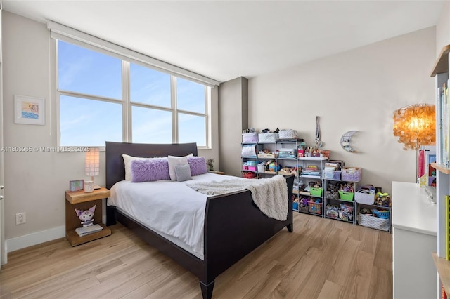 2475 Brickell Ave Unit 2002, Miami, FL 33129 - bedroom with light wood-type flooring and baseboards