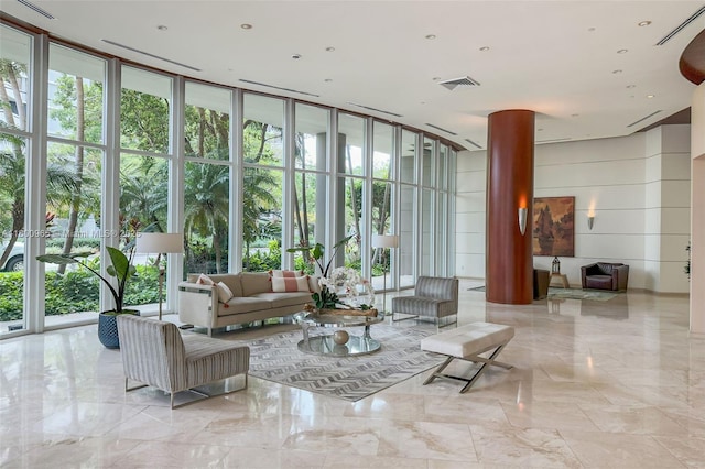 2475 Brickell Ave Unit 2002, Miami, FL 33129 - community lobby with a wall of windows and wooden walls