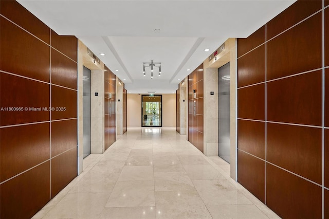 2475 Brickell Ave Unit 2002, Miami, FL 33129 - corridor featuring recessed lighting and a tray ceiling