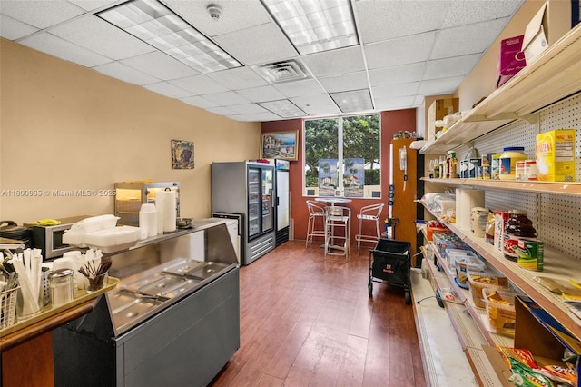 2475 Brickell Ave Unit 2002, Miami, FL 33129 - home office with wood-type flooring and a paneled ceiling