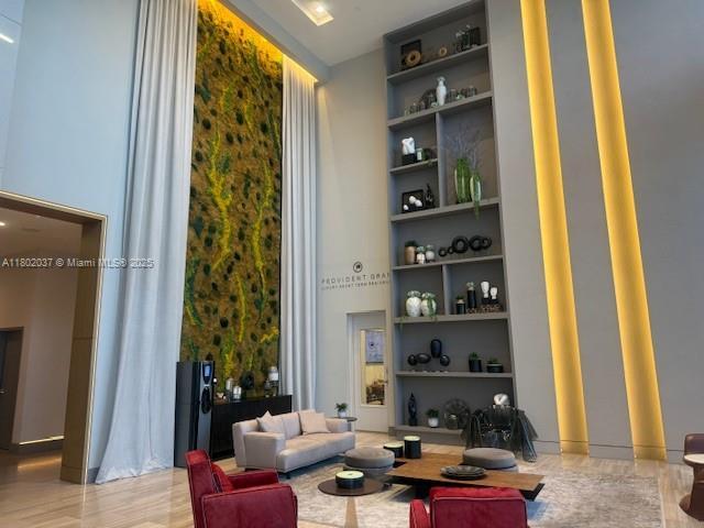 5350 NW 84th Ave Unit 1207, Doral, FL 33166 - building lobby featuring a high ceiling