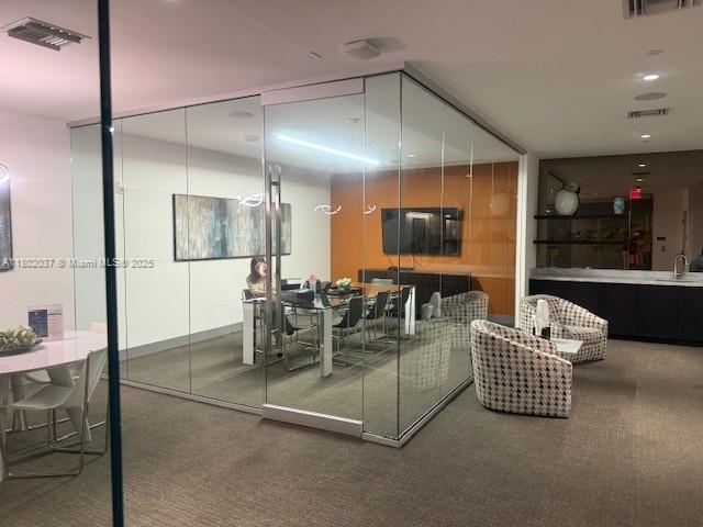 5350 NW 84th Ave Unit 1207, Doral, FL 33166 - carpeted dining space with a sink