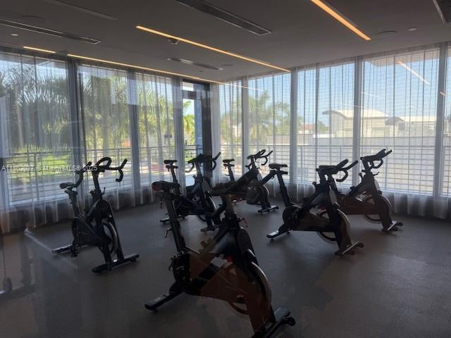 5350 NW 84th Ave Unit 1207, Doral, FL 33166 - gym with floor to ceiling windows