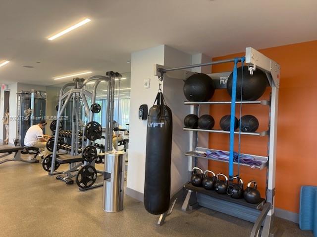 5350 NW 84th Ave Unit 1207, Doral, FL 33166 - gym featuring baseboards