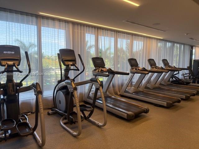 5350 NW 84th Ave Unit 1207, Doral, FL 33166 - gym featuring carpet floors