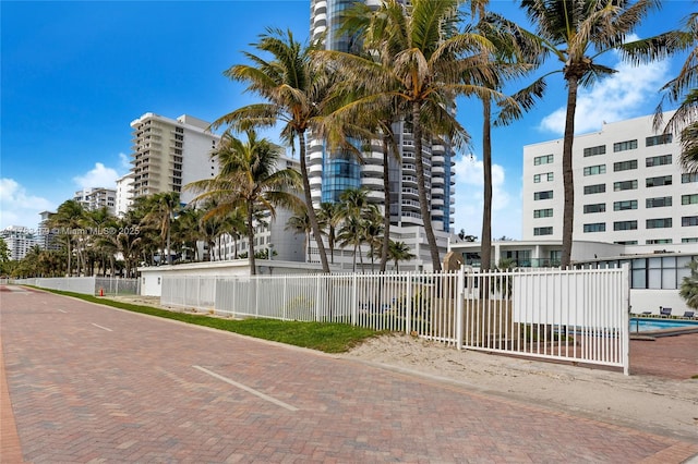 6345 Collins Ave Unit 522, Miami Beach, FL 33141 - view of apartment building / complex featuring fence