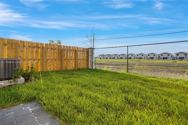 18953 SW 344th Ter, Homestead, FL 33034 - view of yard with central air condition unit