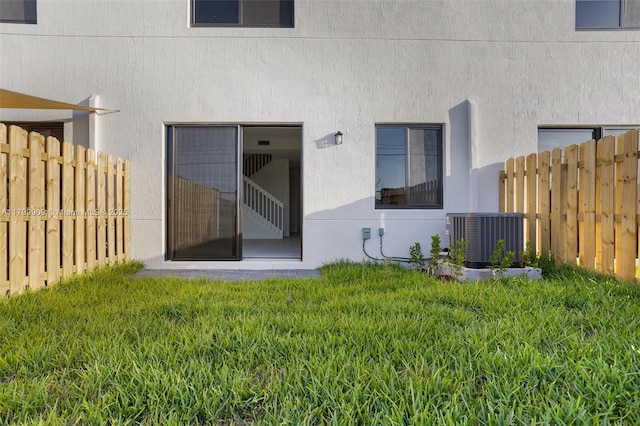 18953 SW 344th Ter, Homestead, FL 33034 - entrance to property with cooling unit and stucco siding