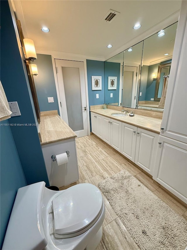 16518 NE 26th Ave Unit 405, North Miami Beach, FL 33160 - full bath featuring vanity, recessed lighting, and wood finished floors