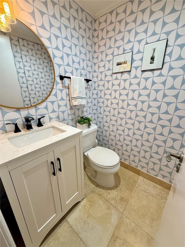 16518 NE 26th Ave Unit 405, North Miami Beach, FL 33160 - bathroom featuring wallpapered walls, toilet, and vanity