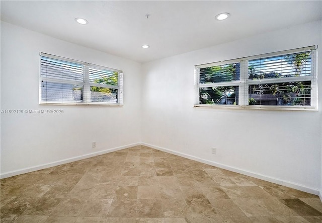 1911 NE 206th Ter, Miami, FL 33179 - empty room with recessed lighting, baseboards, and fire sprinkler in ceiling