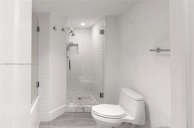 6061 Collins Ave Unit 7D, Miami Beach, FL 33140 - full bathroom with toilet, tiled shower, baseboards, recessed lighting, and a bath