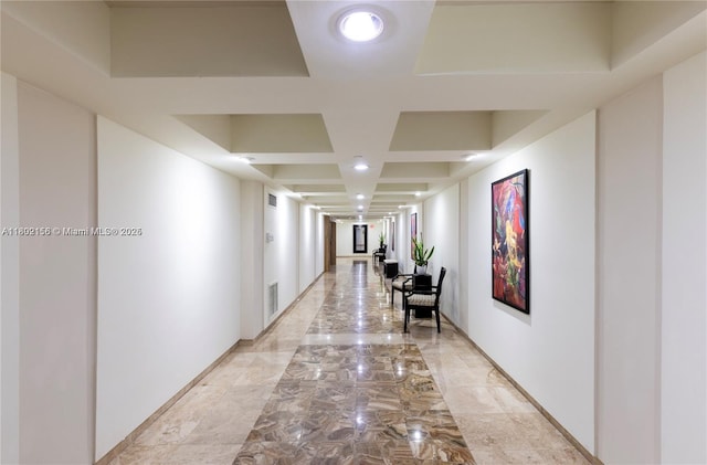 6061 Collins Ave Unit 7D, Miami Beach, FL 33140 - hallway featuring coffered ceiling, baseboards, light marble finish floors, and recessed lighting