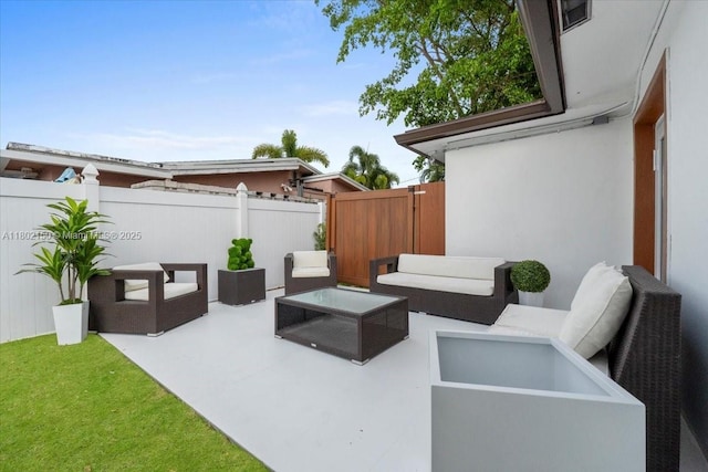 1910 NW 36th St, Oakland Park, FL 33309 - view of patio / terrace featuring outdoor lounge area and fence