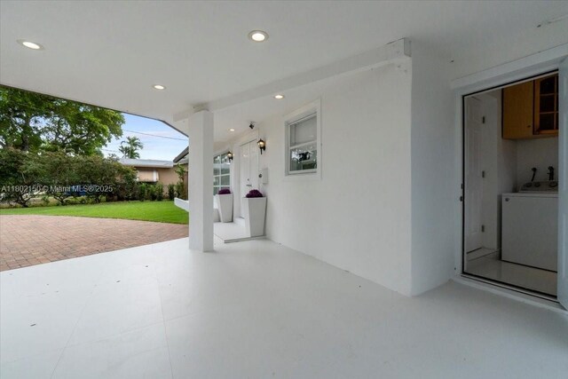 1910 NW 36th St, Oakland Park, FL 33309 - view of patio / terrace with washer / dryer
