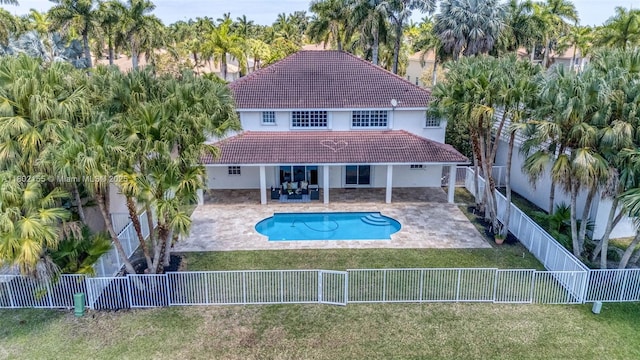 2521 Hunters Run Way, Weston, FL 33327 - rear view of property with a tile roof, stucco siding, and a patio area