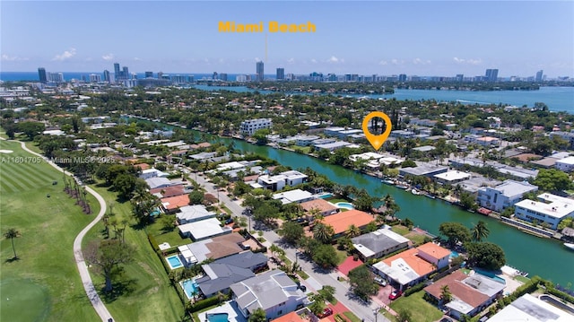 1785 Calais Dr Unit 7, Miami Beach, FL 33141 - aerial view of residential area featuring a view of skyline and a large body of water