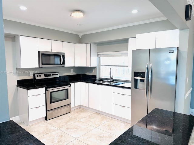 8761 NW 12th St, Pembroke Pines, FL 33024 - kitchen featuring appliances with stainless steel finishes, a sink, ornamental molding, white cabinetry, and recessed lighting